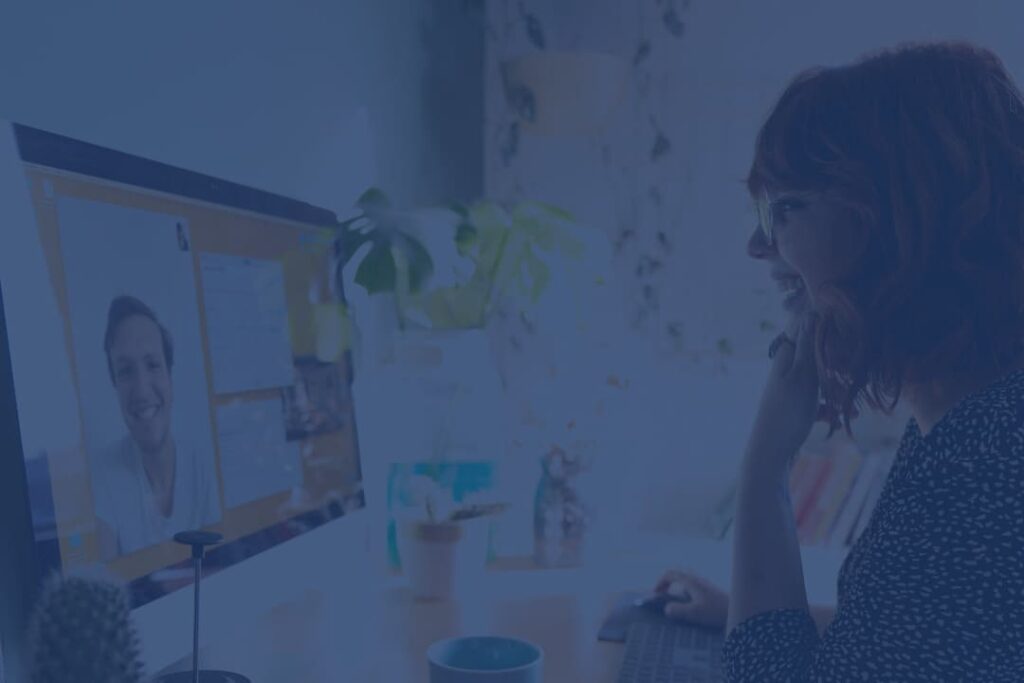 woman engaging in a video call on her desktop, representing remote communication, virtual meetings, and digital connectivity.
